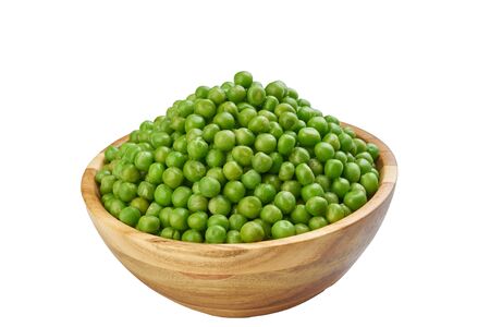 fresh peas in bowl cutted on white frozen vegetablesの写真素材