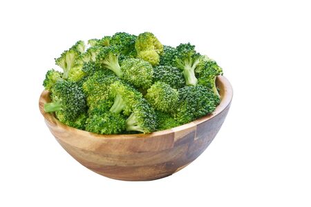 broccoli t in bowl cutted on white frozen vegetablesの写真素材