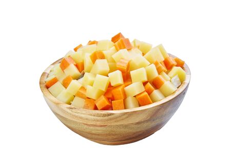potato, pepper,  peas, carrot in bowl cutted on white frozen vegetablesの写真素材