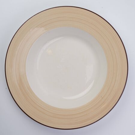colorful ceramic plate on white background for flatlaysの写真素材