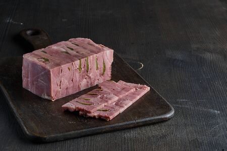 turkey ham with cucumbers on blackの写真素材