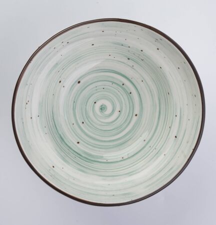 colorful ceramic plate on white background for flatlaysの写真素材