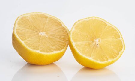 two lemon slices on white isolatedの写真素材