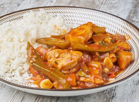 vegetable stew with rice on plateの写真素材
