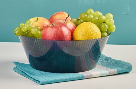bowl of fruit on towelの写真素材
