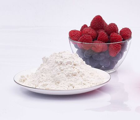 raspberry and blueberry and wheat on white isolatedの写真素材