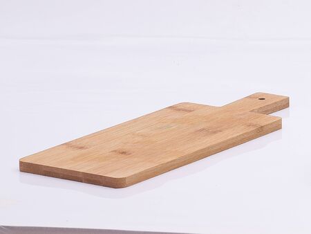 wooden kitchen board on white isolatedの写真素材