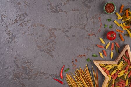 Pasta assorti on gray backgroundwith boxの写真素材