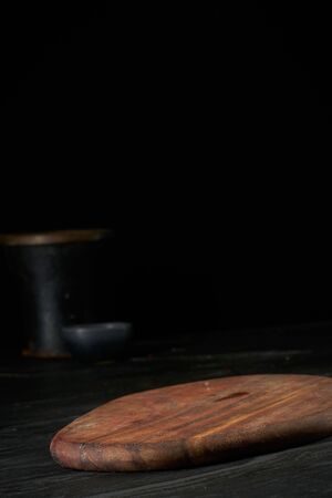 wooden tray on black backgroundの写真素材