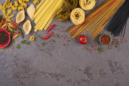 Pasta assorti on gray backgroundwith boxの写真素材
