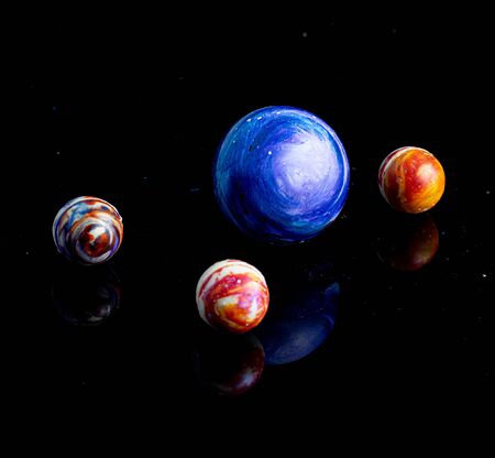 chocolate candies on black stone black background