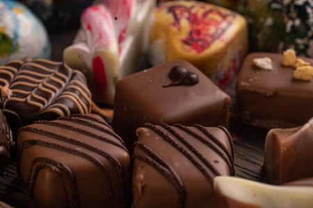 assorted chocolates on black plateの写真素材