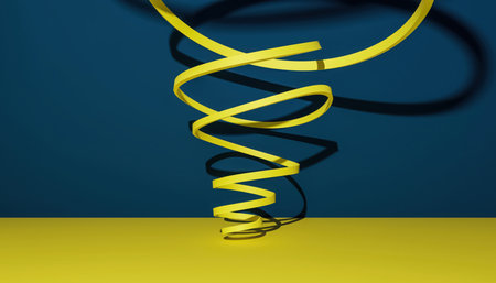 The scene features a vibrant yellow, three-dimensional spiral structure positioned centrally. This helical form appears to rise from a flat, golden-yellow surface. It casts a distinct shadow on both the golden surface and the deep blue wall behind it, indicating a light source from the front or side. The contrast between the bright yellow coil and the dark blue background is visually striking. The composition is clean and minimalist, focusing entirely on the geometric shape and its interaction with the colored environment. The texture of the spiral seems smooth and uniform.の素材
