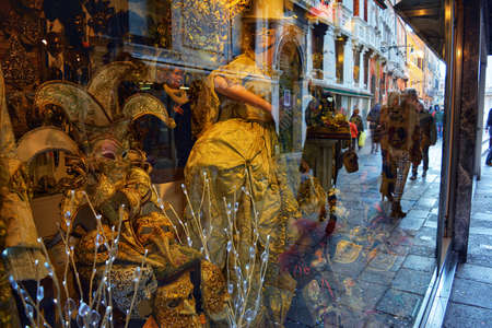 Venice, Italy 02 12 2017, tourists in front of shop windows during carnivalのeditorial素材