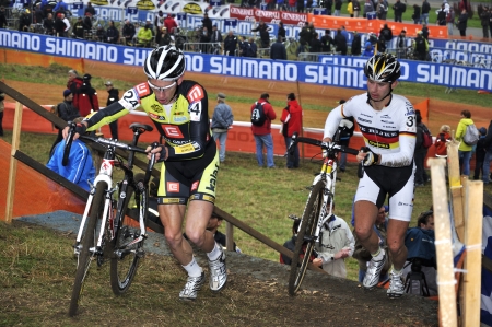 TABOR, CZECH REPUBLIC - OCTOBER 21, Bambula Ondrej 24 and Pfingsten Christoph 31 in Cyclo Cross, UCI WORLD CUP Men ELITE on October 21, 2012 in Tabor, Czech Republicのeditorial素材