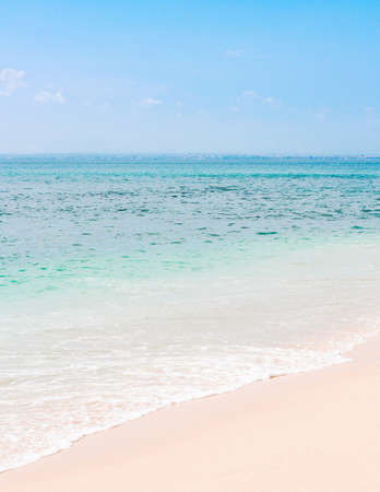 White Sand Beach and Blue Ocean and Skyの写真素材