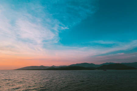 sunset sky over the oceanの写真素材