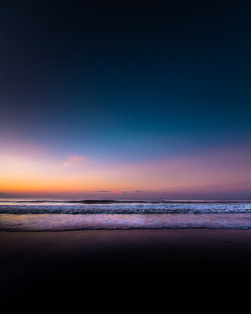 sunset on the beach, beautiful sky and sea, long exposureの写真素材