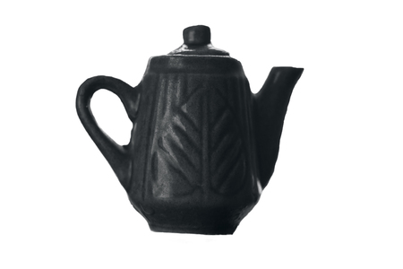 Tea Pot on rough surface with blurred background,with blurred background, isolated, selective focus, shallow depth of field, concept of hot beverages.の写真素材