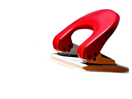 Punching hole machine isolated on white.の写真素材