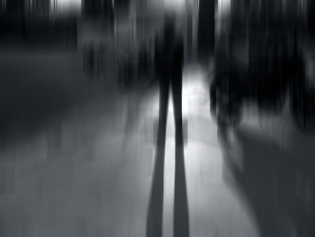two human figure during sunset in street. shot taken with motion blur effect.の写真素材