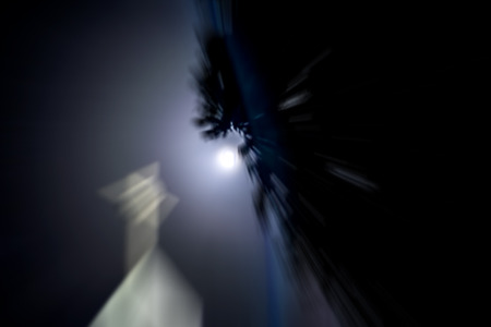 Full Moon in the dark night, shot taken with motion blur effect.の写真素材