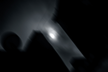 Full Moon in the dark night, shot taken with motion blur effect.の写真素材