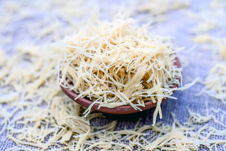 Sev is a popular Indian snack food  consisting of small pieces of crunchy noodles made from rice...