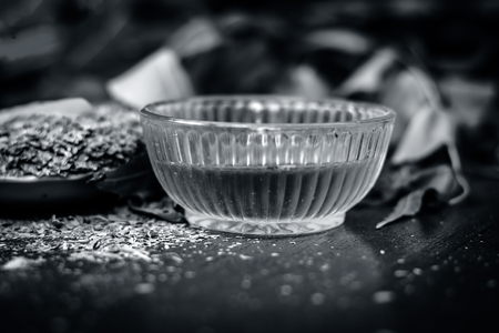 Close up of Indian iliac's powder with its branch of tree and turmeric and honey for teeth care.の写真素材