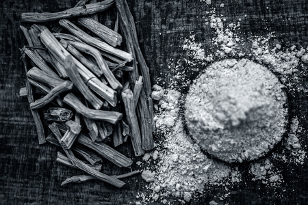 Close up of ayurvedic herb satavari,Asparagus racemosus with its powder and root.の写真素材