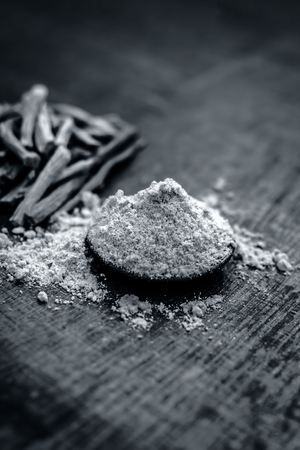 Close up of ayurvedic herb satavari,Asparagus racemosus with its powder and root.の写真素材