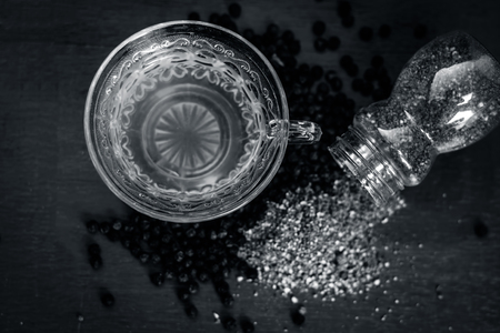 Close up of tea of Black pepper,Piper nigrum with raw black pepper and powder.の写真素材