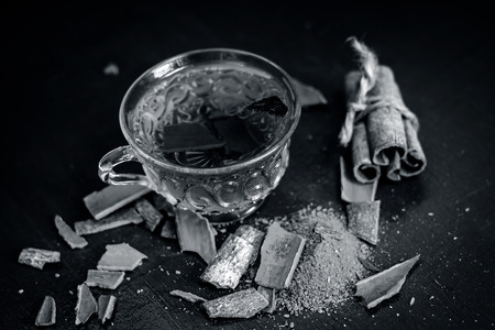 Close up of tea of cinnamon,Cinnamomum zeylanicum  with whole cinnamon and its powder.の写真素材