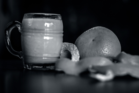 Close up of orange,Citrus aurantium juice on wooden surface.の写真素材