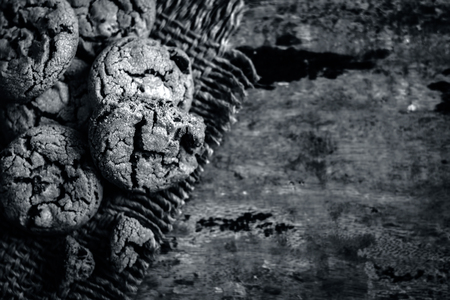 Homemade freshly baked chocolate chip cookies on gunny background.;の写真素材