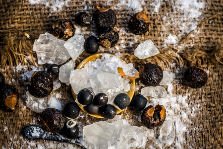 Close up of alum, potassium aluminium sulfate and soap nut,Sapindus ingredients of a traditional...