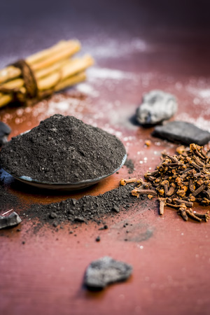 Mixture or ingredients of the traditional toothpaste made in Asia i.e. Coal powder,powder of neem bush,and clove.の写真素材