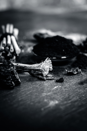 Mixture or ingredients of the traditional toothpaste made in Asia i.e. Coal powder,powder of neem bush,and clove.の写真素材