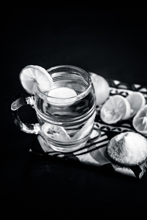 Close up of Indian most popular summer drink Nimbu pani or Nimbo sarbat,Lemonade in a transparent glass with salt.の写真素材