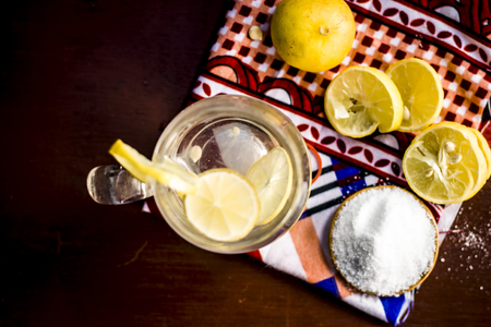 Close up of Indian most popular summer drink Nimbu pani or Nimbo sarbat,Lemonade in a transparent glass with salt.の写真素材