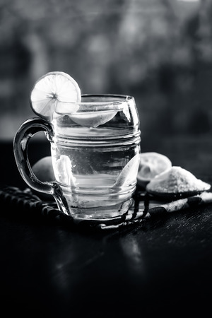 Close up of Indian most popular summer drink Nimbu pani or Nimbo sarbat,Lemonade in a transparent glass with salt.の写真素材