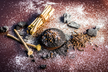 Mixture or ingredients of the traditional toothpaste made in Asia i.e. Coal powder, powder of neem bush, clove, and salt, sodium chloride.の写真素材