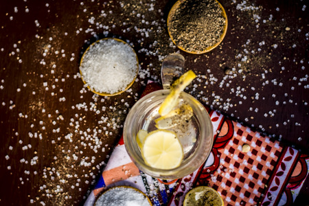 Close up of Indian most popular summer drink Nimbu pani or Nimbo sarbat,Lemonade in a transparent glass with salt.の写真素材