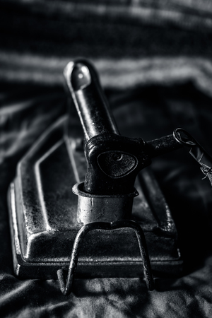 A rusted iron on a blue shiny shirt.の写真素材