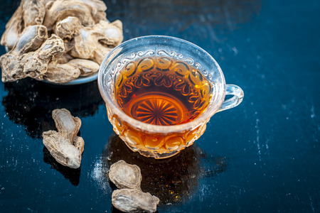 Beneficial tea of dried ginger or Zingiber officinale with benefits like help digestion, reduce...