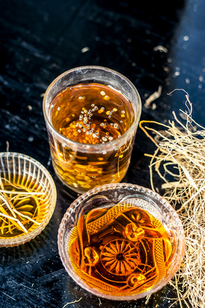 Ancient sharbat or Indian beverages of KHUS or Vetiver grass or Chrysopogon zizanioides with...