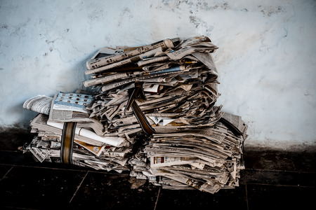 Junagadh,Gujarat,India-2018- April 1st- A bunch of newspaper lying on the floor.の写真素材