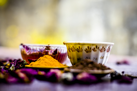 Close up of face pack of chandan or sandalwood i.e. Rose water with turmeric and sandalwood powder.の写真素材