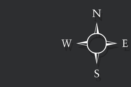Compass sign or symbol with written N,S,E,W north, south ,east, and west direction on it.の写真素材