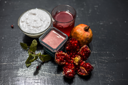 Herbal and organic face pack of pomegranate with curd or curd for flawless skin.の写真素材